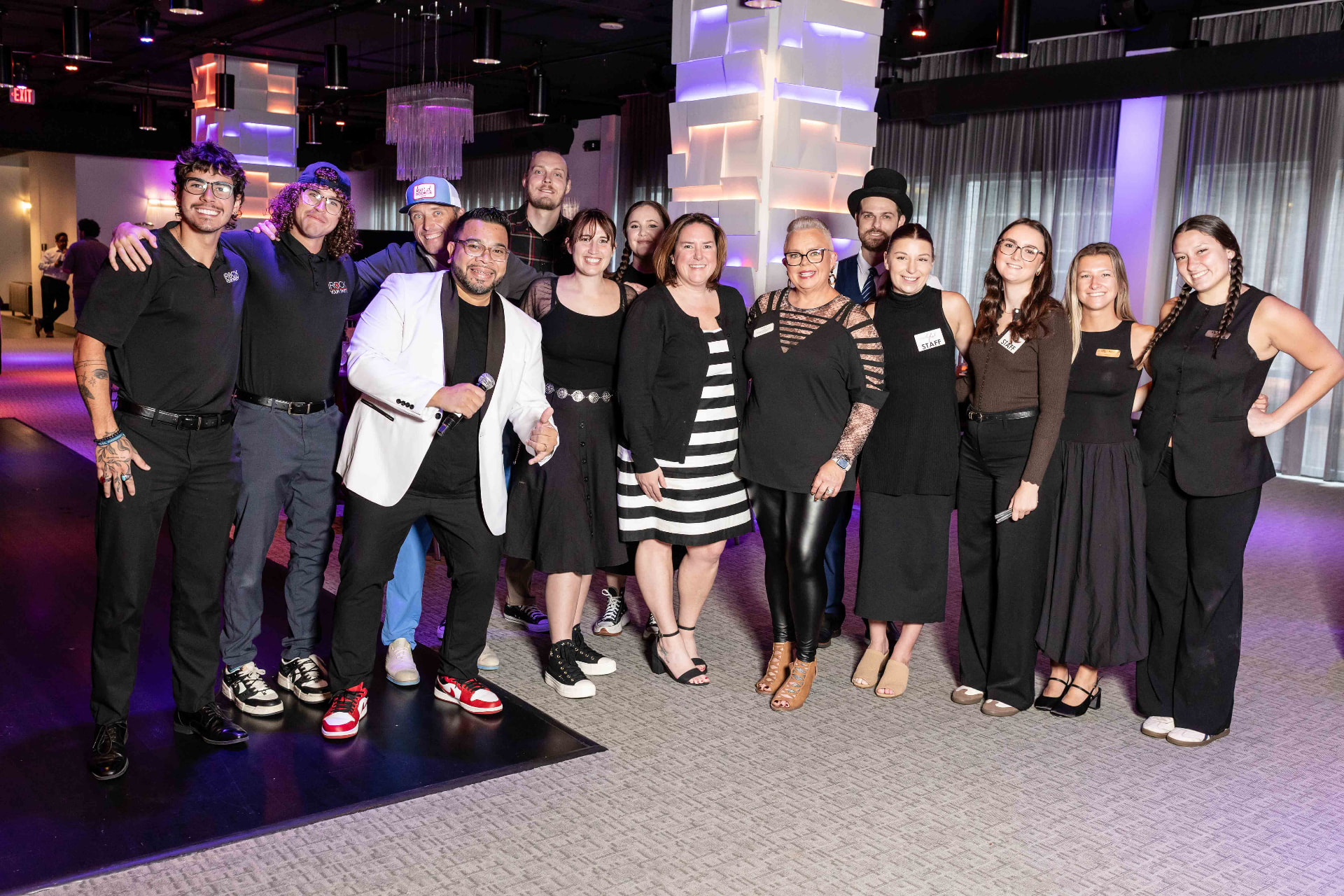 Event production and service team gathered inside The MEZZ